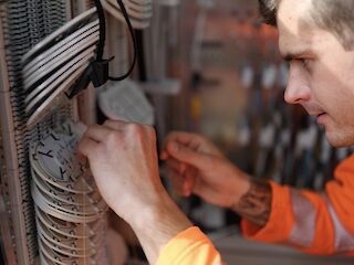 Spleiß-Netz-Worker*in